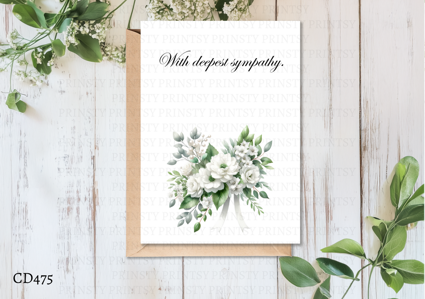 Floral card with greenery on a wooden surface