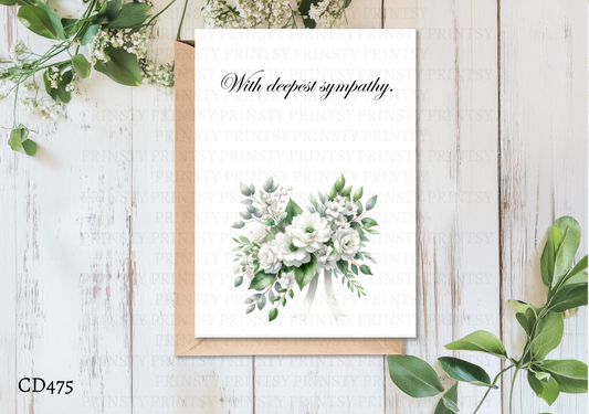 Floral card with greenery on a wooden surface